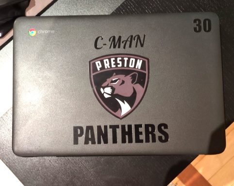 Black laptop cover with a logo featuring a panther and the text "C-MAN and PRESTON PANTHERS 30."